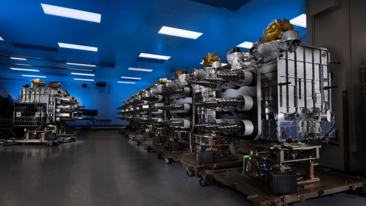 Small Satellite Processing & Delivery center small satellites in a row